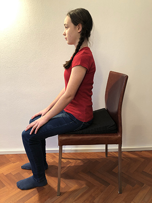 Sitting naturally in a chair
