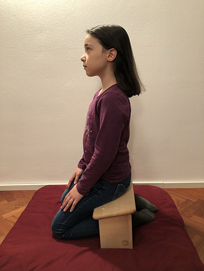 Kneeling with a seiza bench